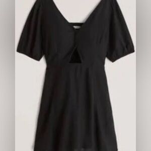 Black mini dress from Abercrombie &Fitch with puff sleeves and a keyhole cutout